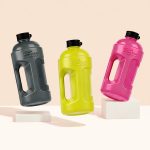 Aqua Monster 2.2L oversized water bottles in black, yellow and pink – durable BPA-free bottles for gym and daily hydration.